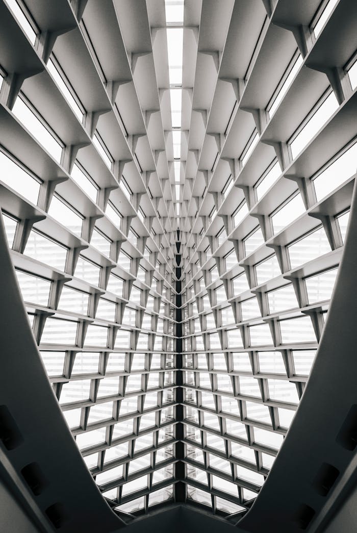 About Modern architectural design with geometric patterns inside Milwaukee Art Museum.